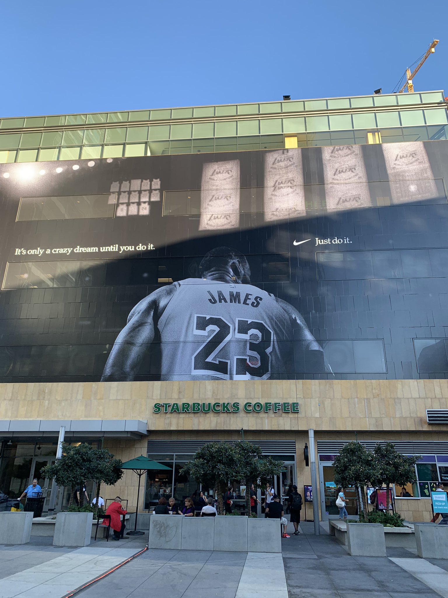 Ben Golliver on X Nike with the massive LeBron James x Lakers billboards blanketing LA Live across from Staples Center https t 4m81JNAxFD X