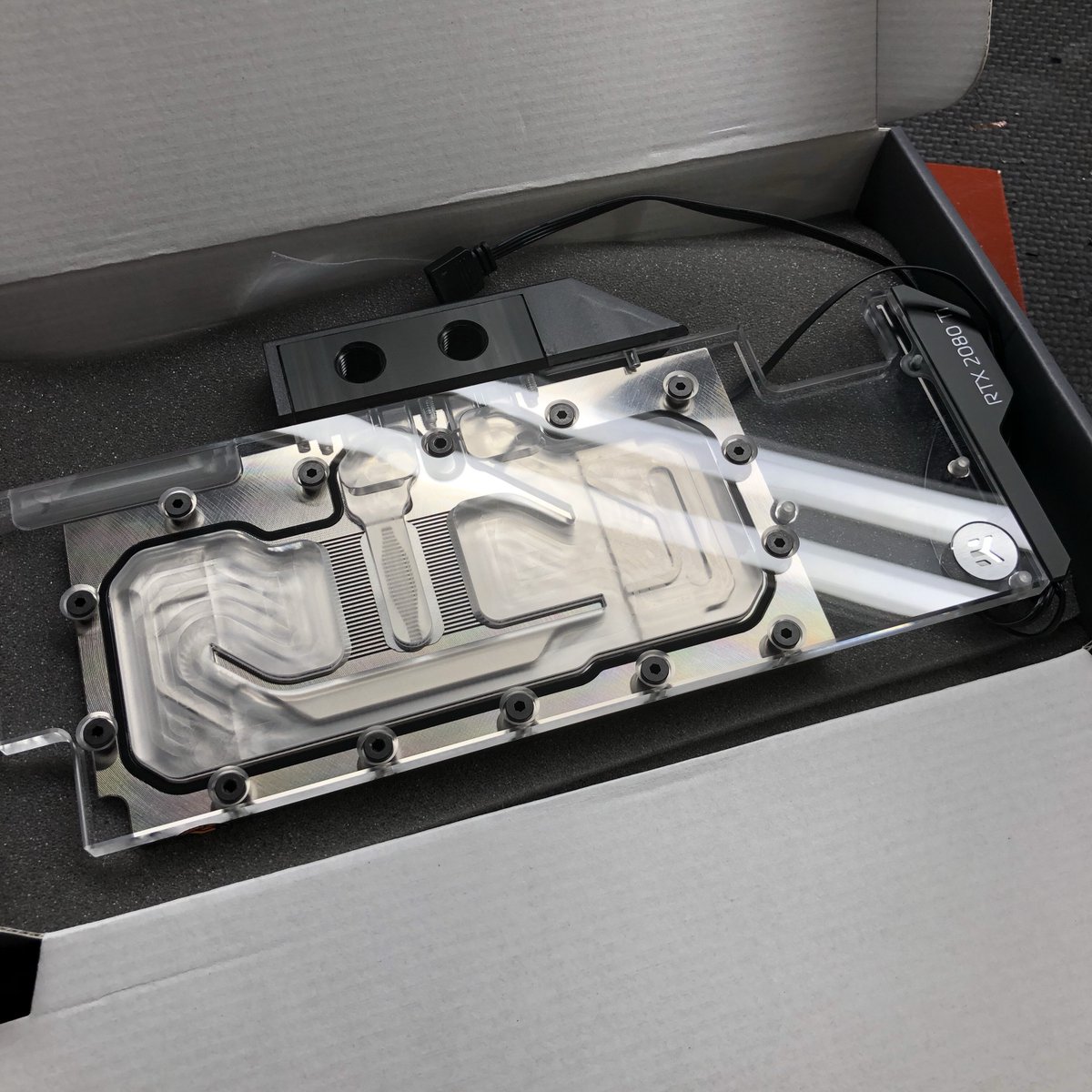 OverkillGame's tweet image. This is the NICEST RTX 2080Ti block we’ve seen yet. EKWB continues to outshine the competition. Can’t wait to use this guy to rework one of our classic builds, can you guess which one? #CustomPCs #LiquidCooling