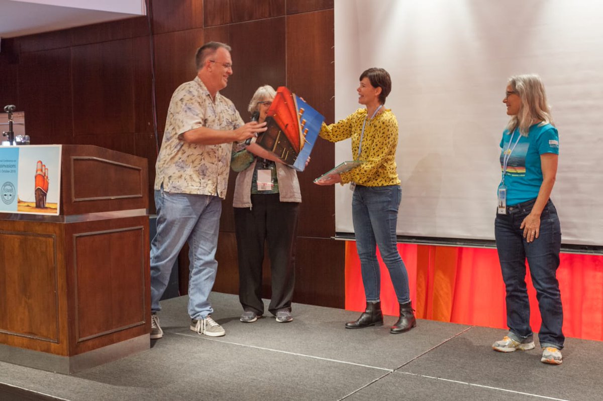 MarBioinvasions's tweet photo. Former President Dr Lisa Drake receives from new Presidents Jeff Crooks and Chela Zabin and from SSCAdvisors Judy Pederson and Jim Carlton, a beautiful Yagui art piece an a certificate of appreciation for her outstanding performance throughout the years on presidency #ICMB2018👏 https://t.co/pJhryJgUsL