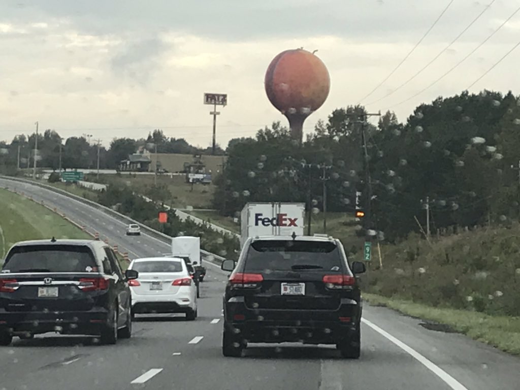 GameDayCharlie's tweet photo. Passing by the peach in Gaffney, SC  with @ArmstrongABC11 on our way to Clemson. #NCStatevsClemson https://t.co/tT16JSTogi