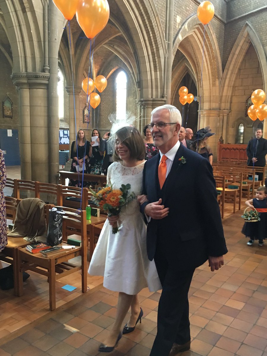Spike_WI's tweet photo. Liz walking up the aisle. Fabulous dress Liz! https://t.co/EFOlwtgWJy