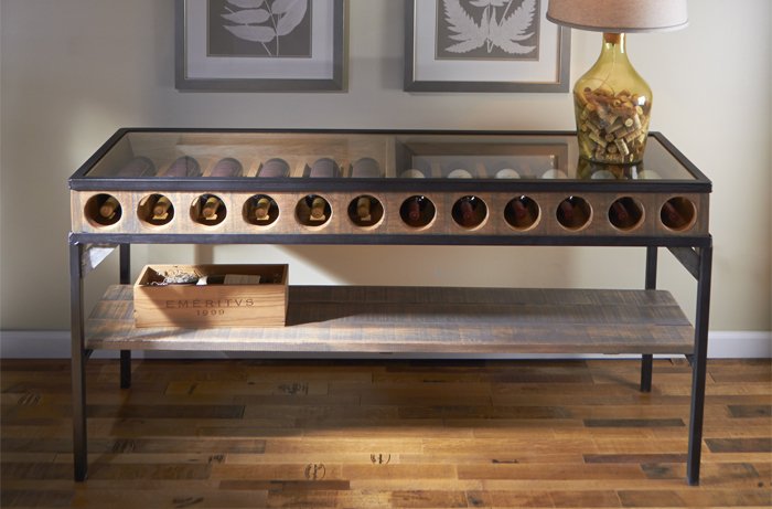 Proudly showcase your favorite decorative labels and bottles with this one of a kind piece of wine barrel furniture. #WEcatalog enth.to/2LOrBk0