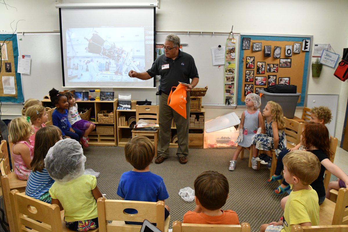 RPCSTweets's tweet photo. Mr. Randy showed pictures from the laboratory, video about the probe and its launch, and even gave out clean suits just like the NASA employees wear! What a fun way for our preschool 4s students to expand their learning in this area of interest! #learningatRPCS #RPCSlittlereds https://t.co/l7C8kuA7oI