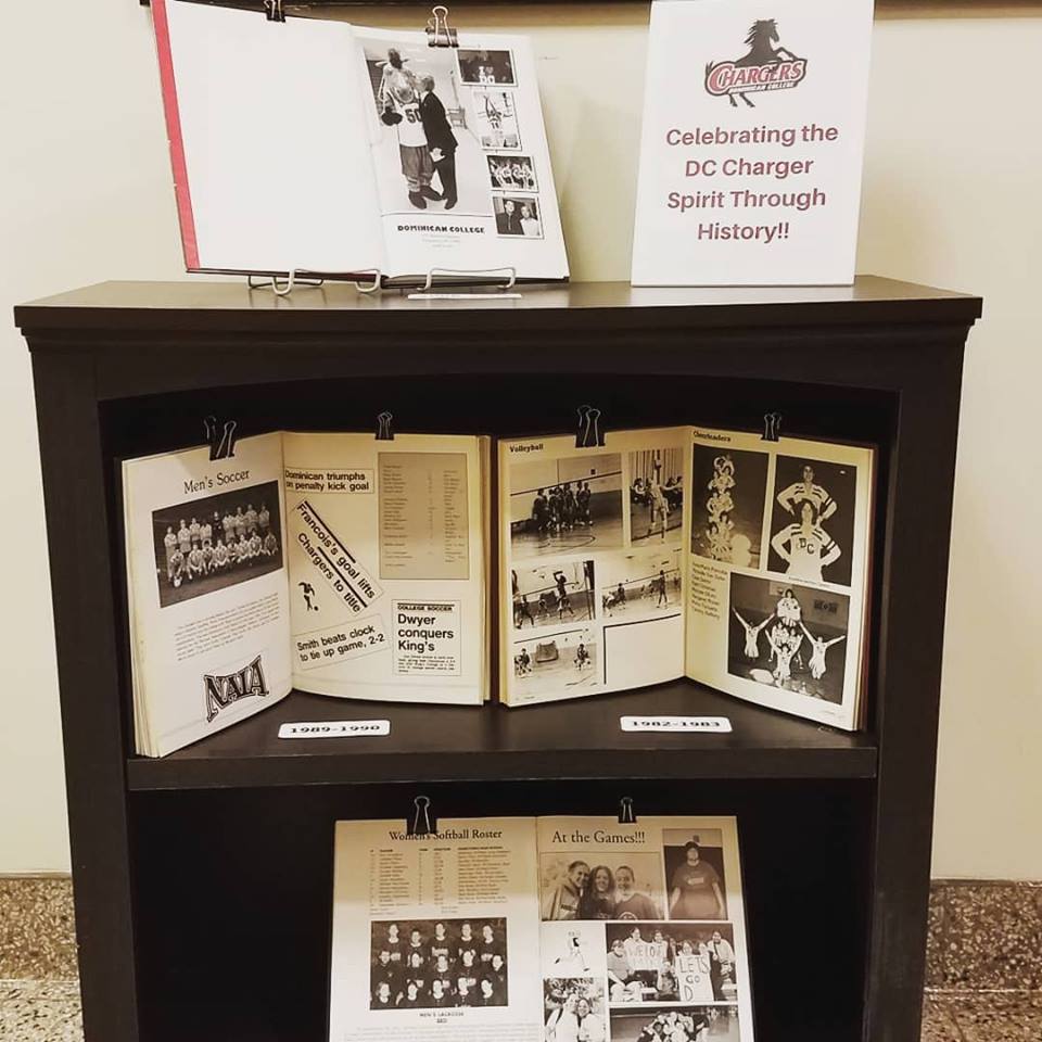 SullivanLibrary's tweet photo. Spirit Week has arrived and we have set up a book display featuring yearbooks that show off the DC Chargers Spirit from years past. Stop by the library and check it out today!! #dcsullivanlibrary #dcchargers #dominicancollege #chargerpride #chargerspirit https://t.co/QET3zhBwJ3