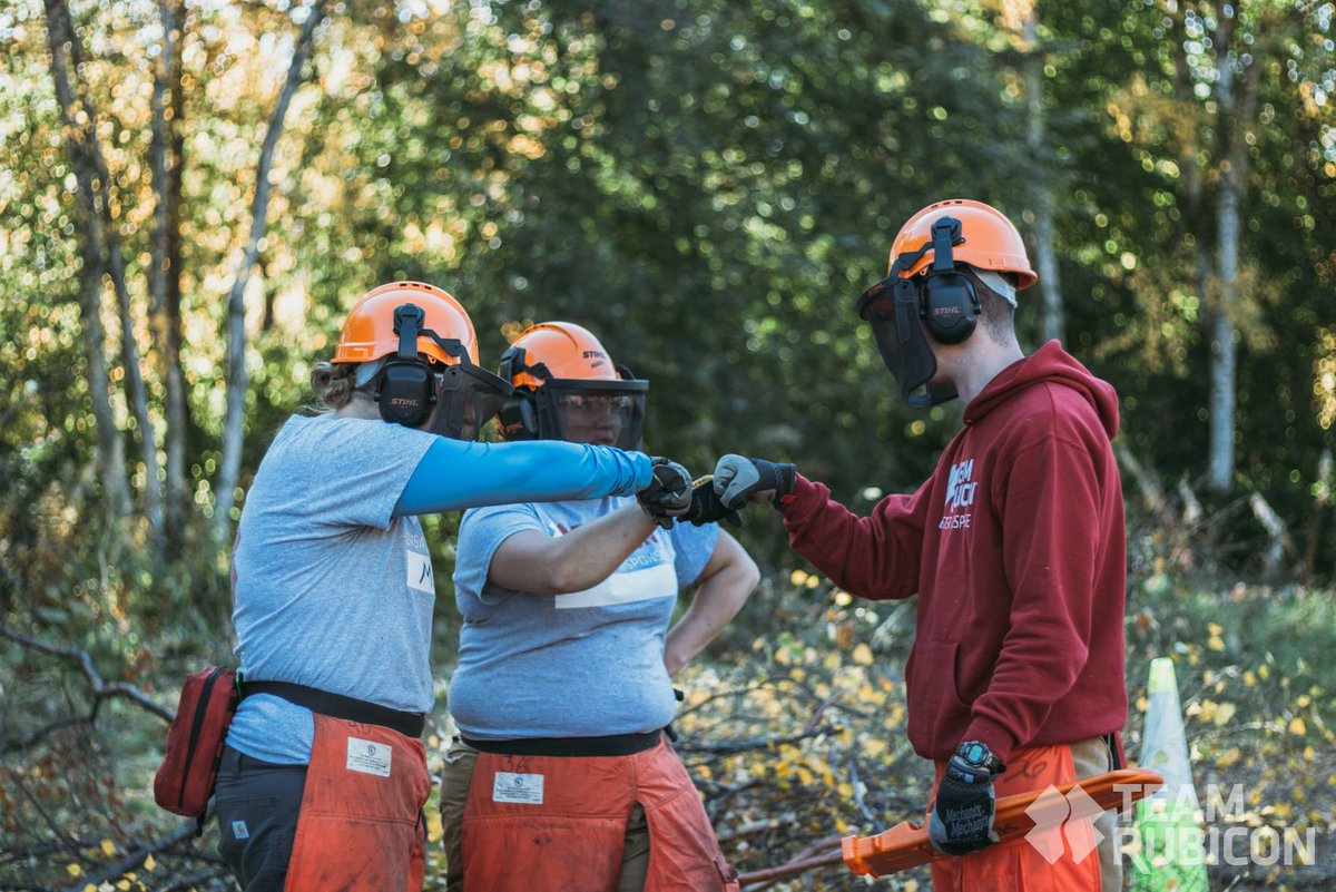 TeamRubicon's tweet photo. How do you stop wildfires? You get ahead of them! Major shout to TR volunteers who stepped up to help the Anchorage Fire Department with fire mitigation in Eagle River, AK. #BuiltToServe #Impact https://t.co/fw3CD7hd6J