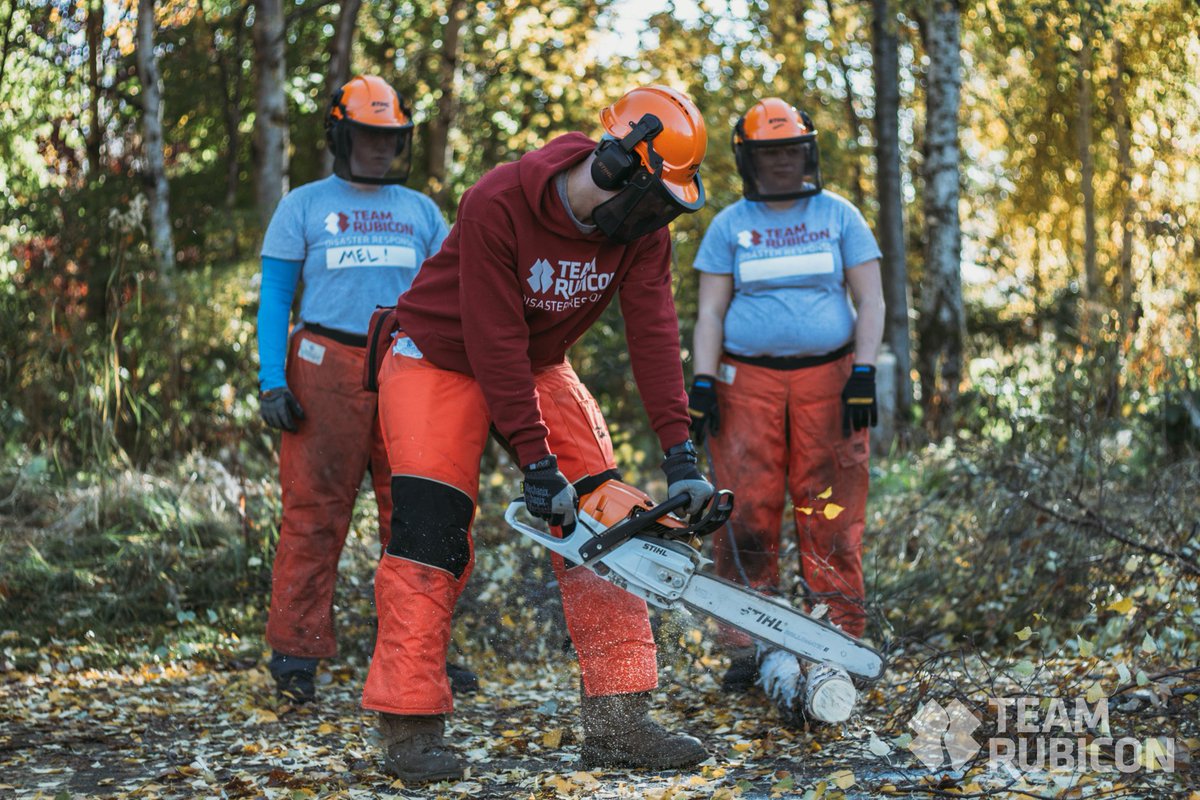 TeamRubicon's tweet photo. How do you stop wildfires? You get ahead of them! Major shout to TR volunteers who stepped up to help the Anchorage Fire Department with fire mitigation in Eagle River, AK. #BuiltToServe #Impact https://t.co/fw3CD7hd6J