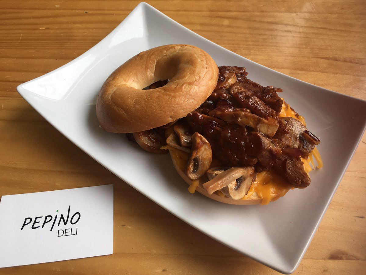 BBQ steak mushroom and cheese on toasted bagel- Deliciously vegan. <a href="/pepinodeli/">Pepino Deli</a>