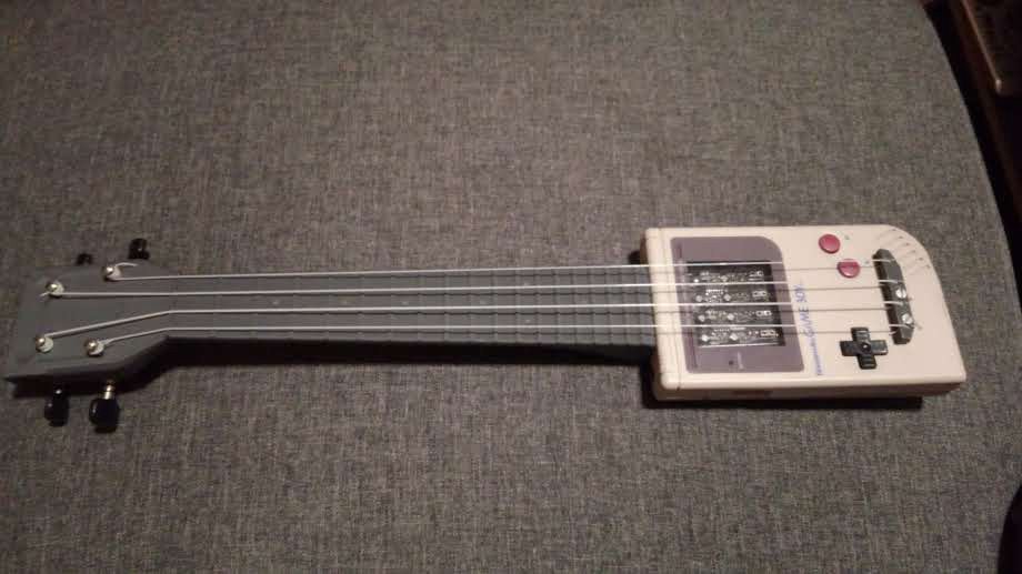 Hacksterio's tweet image. It turns out that a ukulele built around a Game Boy can make sweet chiptunes: bit.ly/2IIseva
