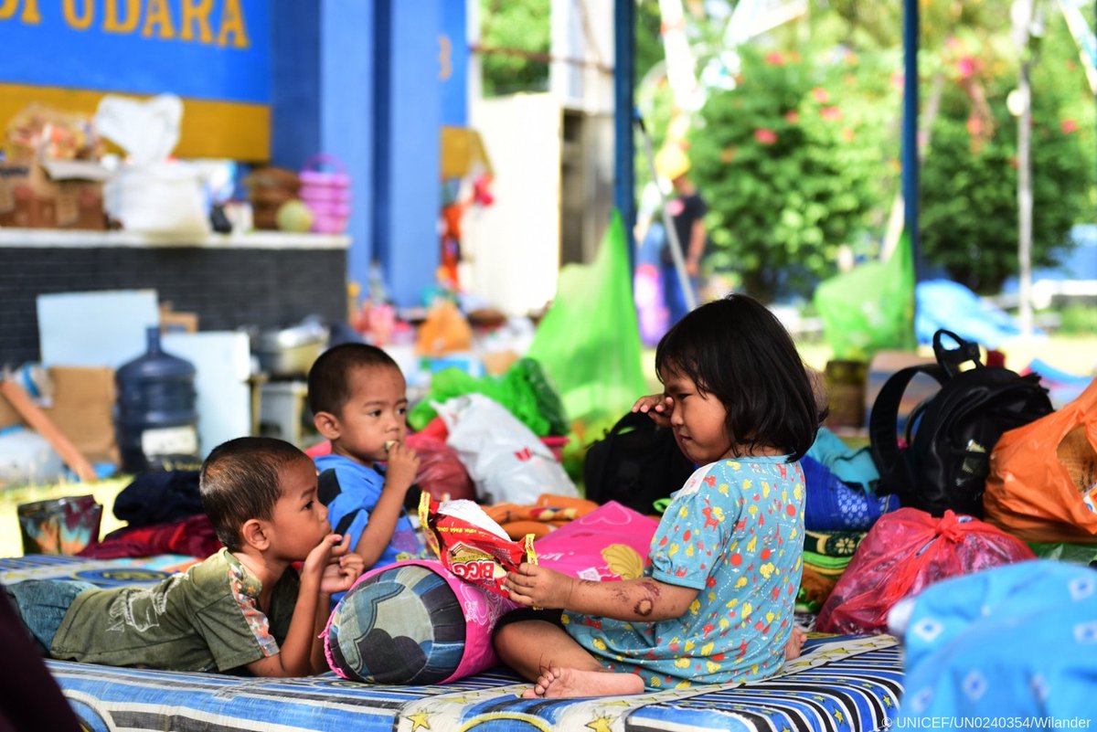 UNICEF's tweet photo. Two boys comfort a girl after feeling the effects of aftershocks in #Indonesia.
 
Children need your support → https://t.co/tzQzyk1Xt6 https://t.co/XTimHW2bQ9