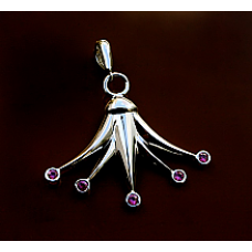 Here is my "Lotus Charm Pendant with Bezel Set Pink Sapphires."  What do you think?

georgechakiris.com/jewelry/lotus-…