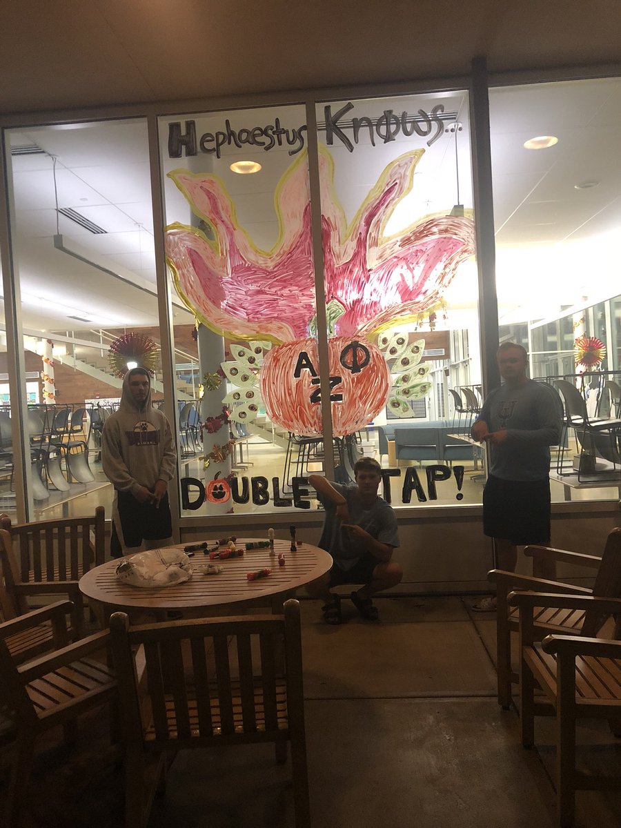 AZPuiu's tweet photo. Sophomores take over homecoming window painting for the “Peacock Pride Ignited... It’s Lit!” theme. https://t.co/GZkyyOxfPK