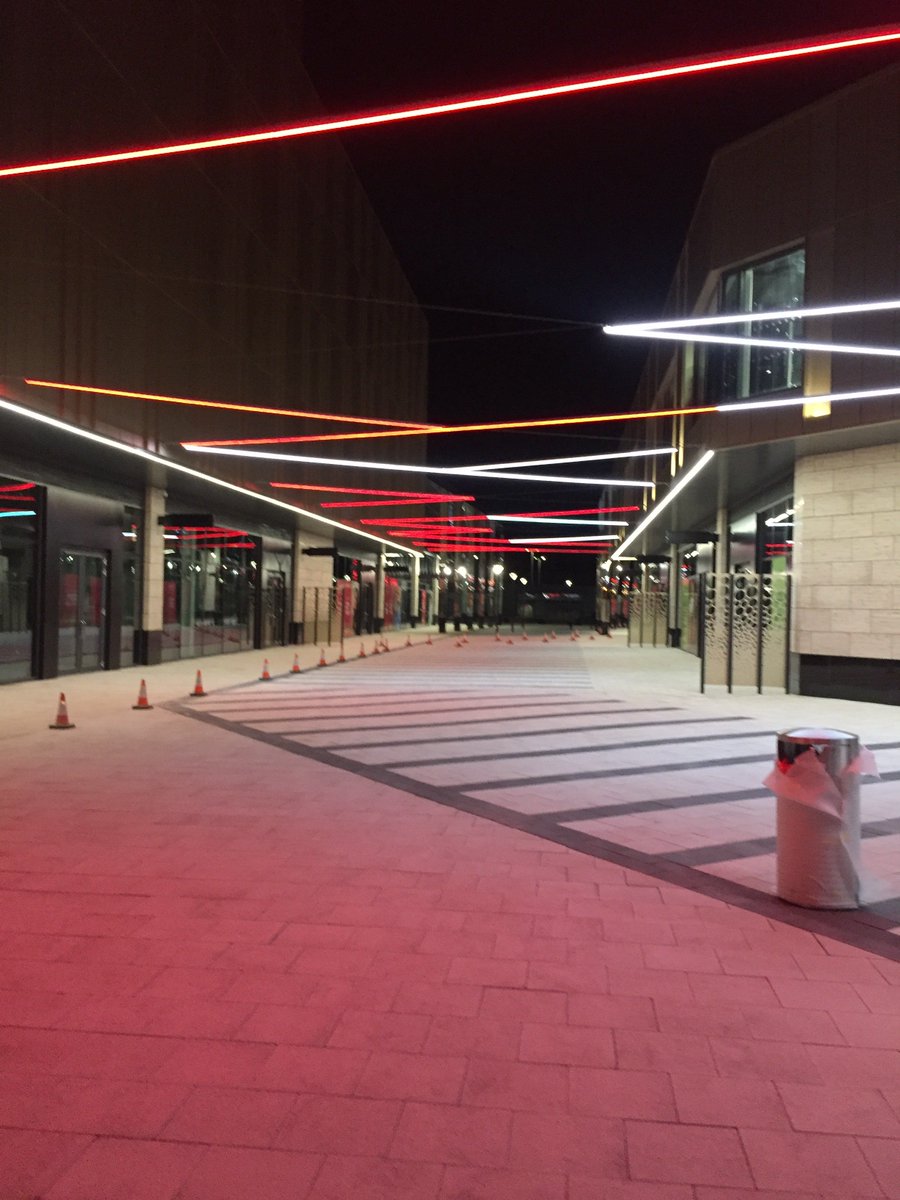 StudiotechLtd's tweet photo. Testing of the catenary lighting at Thorpe Park in Leeds last night, one of our faves so far.  Thanks to @THPArchitects for involving Studiotech in another of theit fantastic projects!  #architecture #lighting https://t.co/lrBBGtyPUi