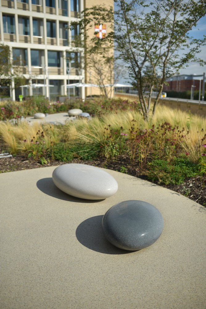 BarrellSculptor's tweet photo. Pico Pebble Seats at the Cambridge Triangle. #PebbleSeats #outdoorseating #landscaping The sculptural seats add beauty and fun to a space designed as a place for hardworking staff to relax. https://t.co/WDSWoSKve7