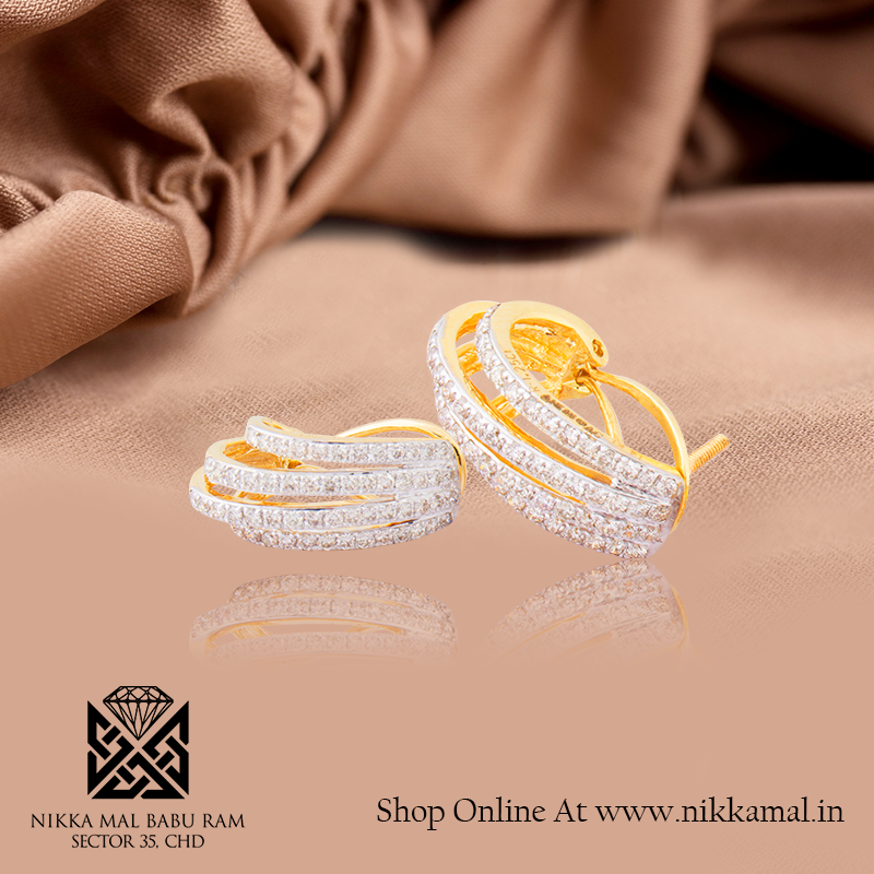 Perfect studs for a night out, they'll make your ears shine. Available at Nikka Mal. nikkamal.in 

#NikkaMalBabuRamJewellers #JewellersInChandigarh #BestJewellersInChandigarh #DiamondStuds #ShopEngagementRingsOnline #BuyDiamondJewellery