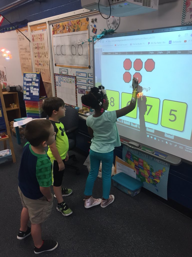 K centers in action!! Love how S’s are taking turns at the smart board!