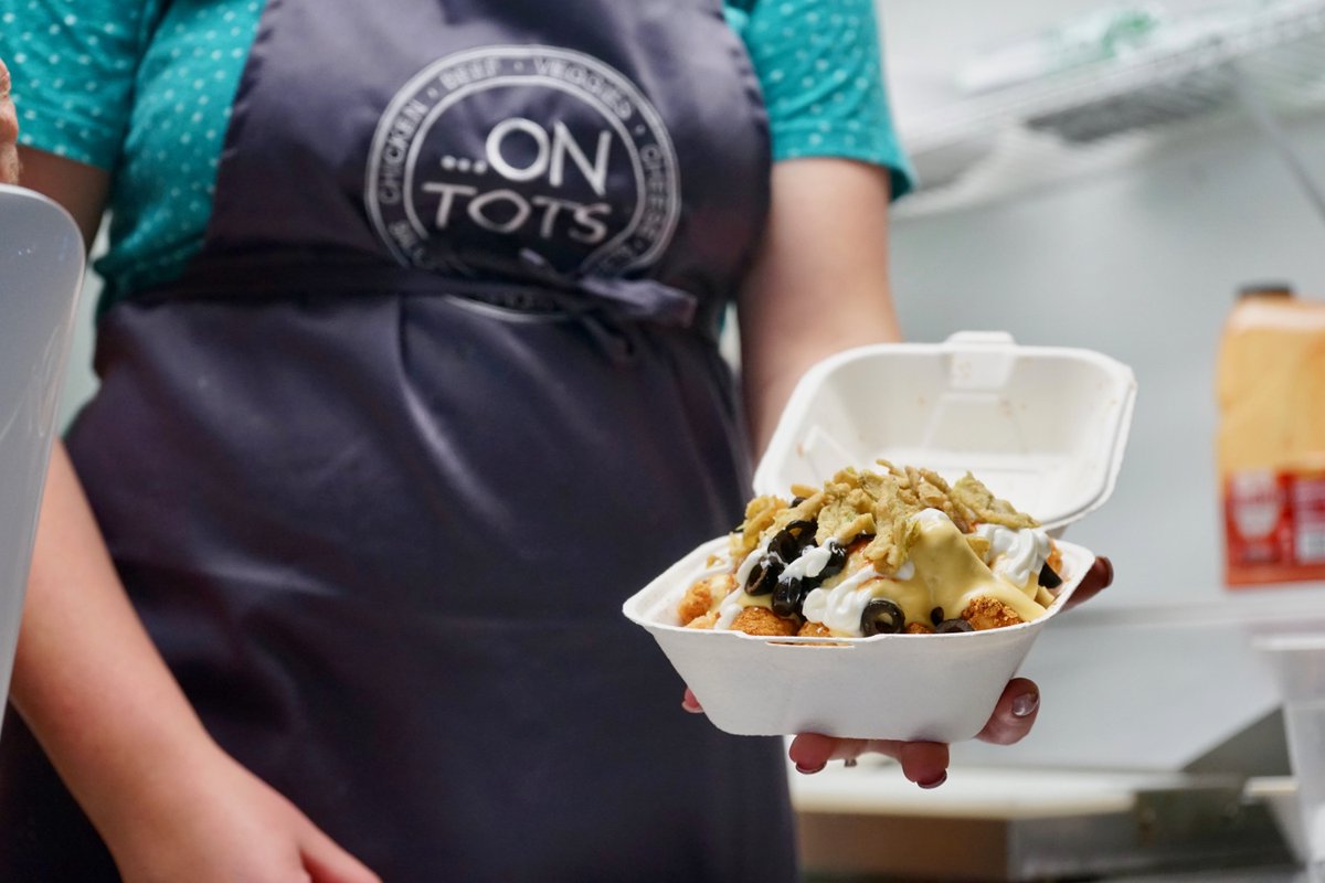 flypdx's tweet photo. #SpottedatPDX: Do you like your tots Black 'N' Blue or extra Loaded? Say hello to @On_Tots, the new family owned and run tater tot food cart. Open now at PDX, pre-security. https://t.co/ZjS835EKlI