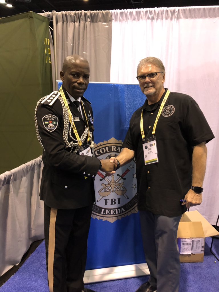 deancrisp's tweet image. Meeting the Head of the Nigerian Police Force at the IACP @FBILEEDA booth.  Great to see so many dedicated law enforcement professionals in one location.  What an honor to be here with them.