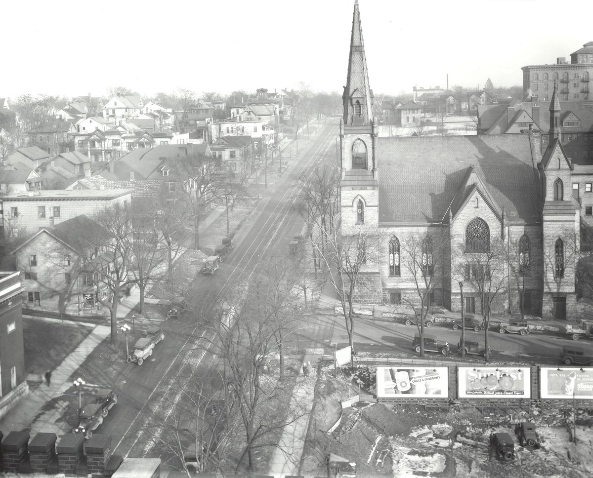 GR_History's tweet photo. Michigan Street NE, Grand Rapids, MI. What is now Medical Mile. The Immanuel Lutheran Church is still there today, but not much else. Photograph taken from the Fox Brewing Co. building in 1932. Curtesy of the Grand Rapids City Archives. https://t.co/rhN6nYgVOT