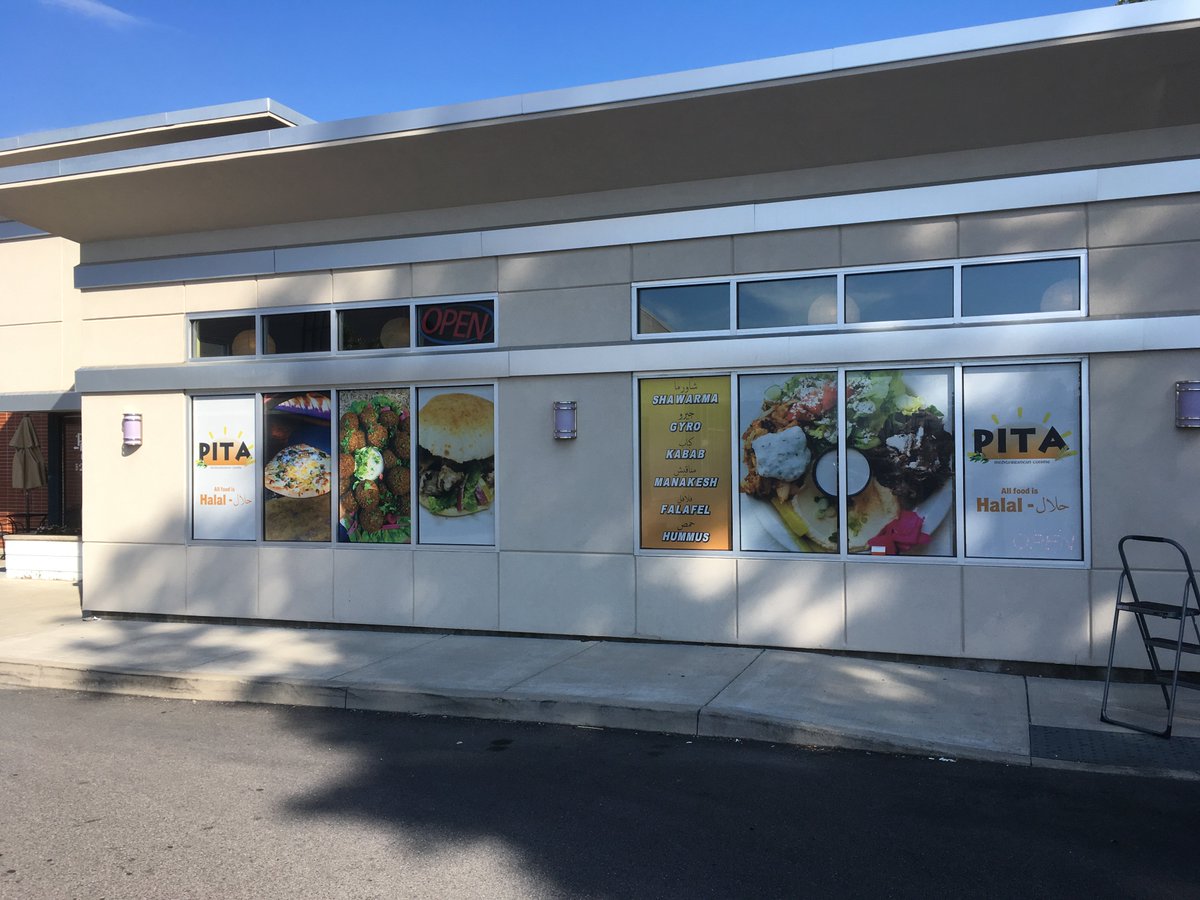 What a lovely day to stop by Pita in College Town! Looking great with their new window wrap that went up today. #windowwrap #graphics #speedproroc #restaurant #roc #rochester
