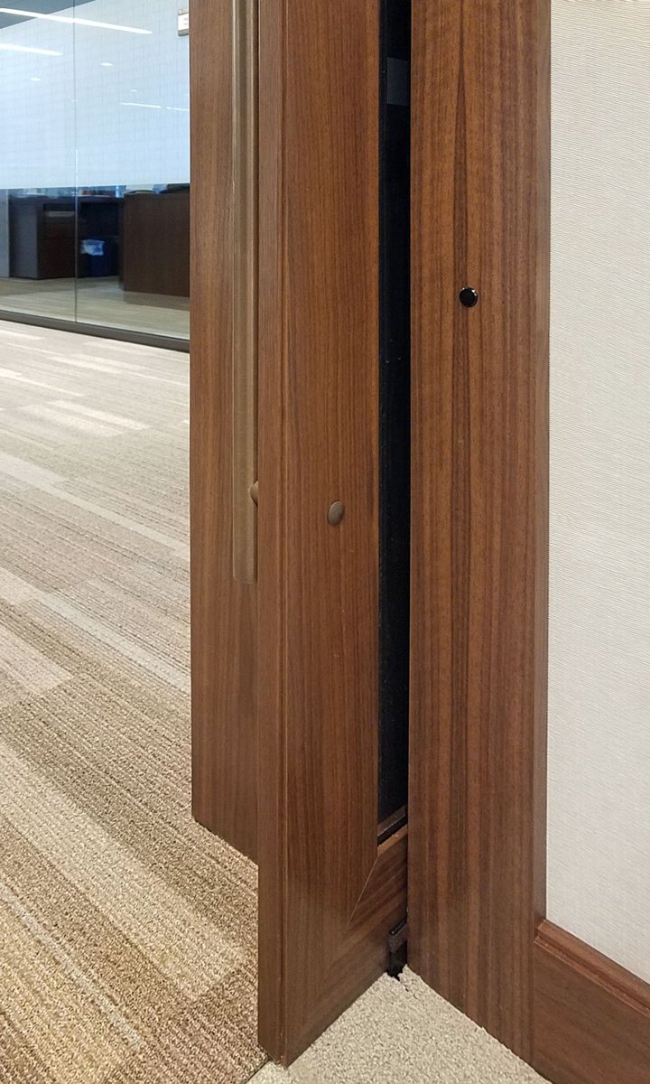 cavityslidersus's tweet photo. Large bi-parting automatic doors close off the CEO’s office in a Horizon Blue Cross Blue Shield insurance building in New Jersey. Each door weighs approximately 400lb and opens and shuts daily with the assistance of Cavity Sliders automatic systems @turner_talk https://t.co/vjElCZxUJJ