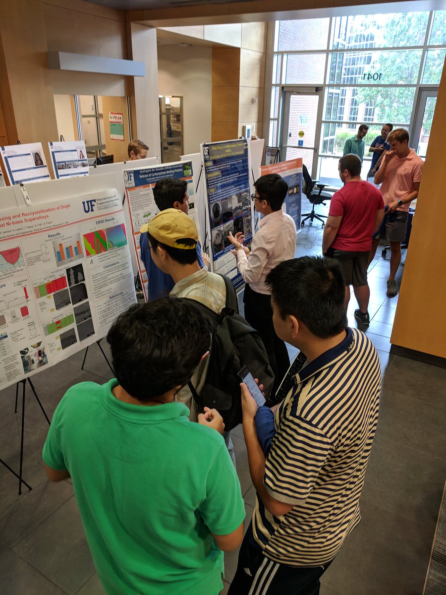 Attendees at the <a href="/UF/">FLORIDA</a> celebration of  #NationalNanoDay hosted by <a href="/UFNIMET/">NIMET</a> and <a href="/ufhwcoersc/">UF Research Service Centers</a> can't wait for the poster session to talk about their exciting work.