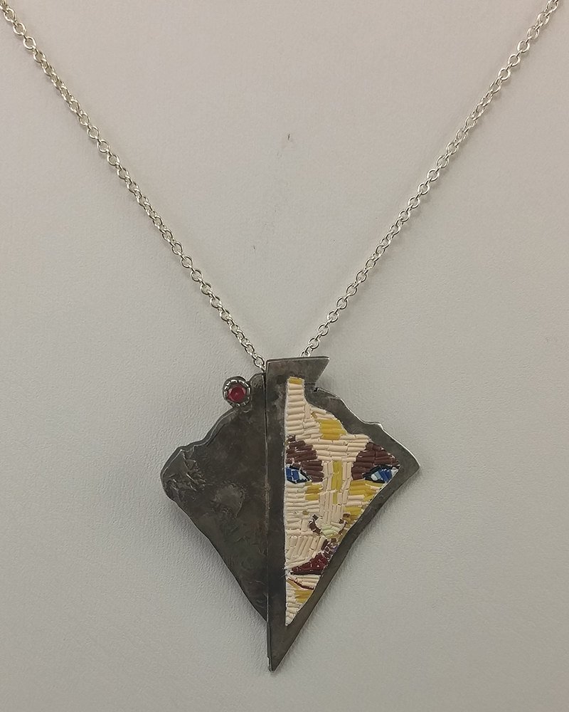 Still testing out Etsy's new advertising thing, figured I'd share one of my more unique pieces. Woman's Portrait Pendant etsy.me/2REkMW7 #jewelry #necklace #reticulatedsilver #micromosaic #sculpeyclay #portrait #silverpendant #rubysilverpendant #ruby