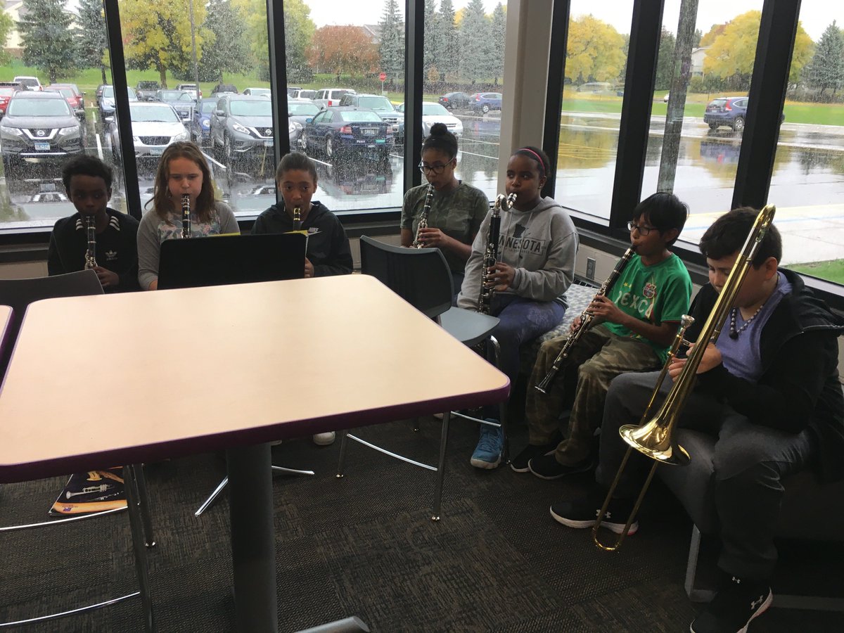 EPPenguins's tweet photo. 5th grade band practicing during recess on a rainy day https://t.co/ccaBwgf7Hr