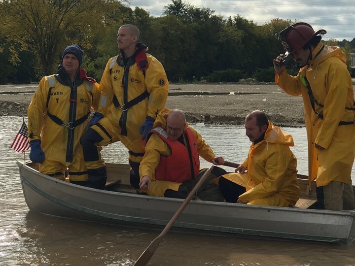 West_Allis_Fire's tweet photo. The Station 3 Crew pulled out our old rowboat to do some water rescue training in the flooded construction site at the old AMF Bowling Alley...and had a little fun while doing some good work. Remind you of anything? https://t.co/BiAleWvZaQ