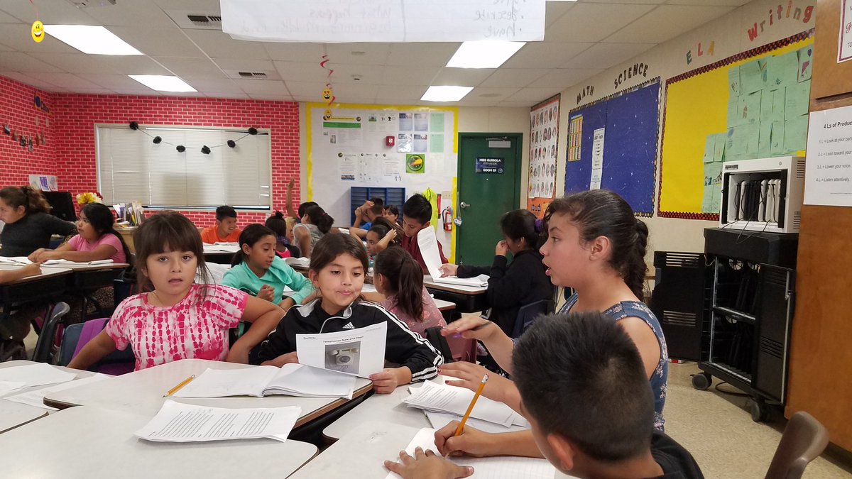 HavensmMike's tweet photo. Miss Gurrola looking at two sources with her students as they write about telephones vs cell phones. Which one do you prefer? @FGurrola91 @CasaLomaSchool #teamBCSD https://t.co/Qc4nQYFaju