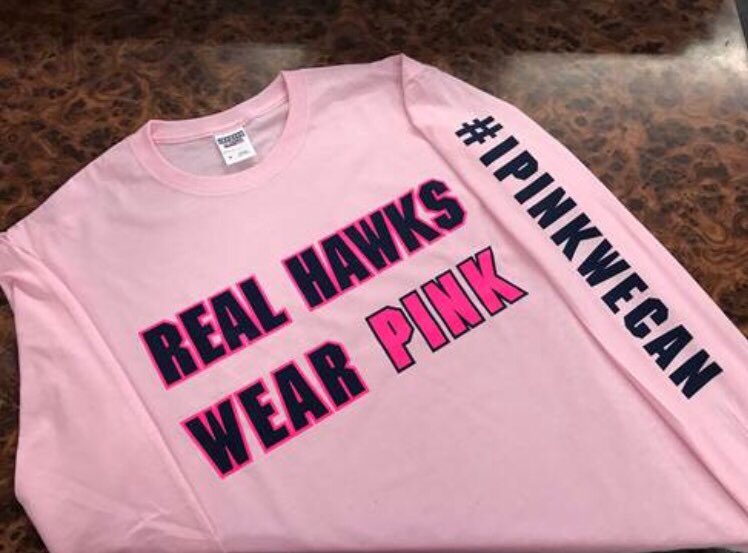 hawksquadprez's tweet photo. They’re finally here! THE OFFICIAL Gravel Pit/Pink Out shirts go on sale tomorrow at the Hawks Nest! Shirts are long-sleeved and have our official theme on them. $15 each! We sell out everywhere so get yours ASAP and Pink Week is October 22-26🎀💖🎀💗💕💝💘 https://t.co/nhVPuUldY8