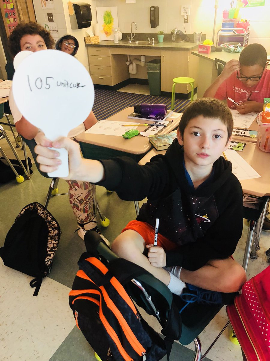 wildabout5th's tweet photo. Two thumbs up for these dry erase paddle boards! Students found the volume of rectangular prisms using unit cubes and wrote the volume on their board. I got to quickly assess who got it, and the kids thought it was great! #teacherwin #iteachfifth @AlachuaSchools https://t.co/PYMlR6Zbbs