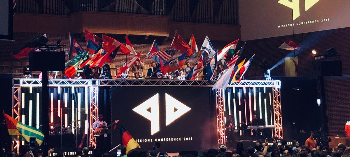 thadbergmeier's tweet photo. The flag processional at #mbimc18. It’s a lot cooler now than it was when I was a student here. #EveryEthne repping ⁦@ABWE_Intl⁩ https://t.co/yiFnFzJ139