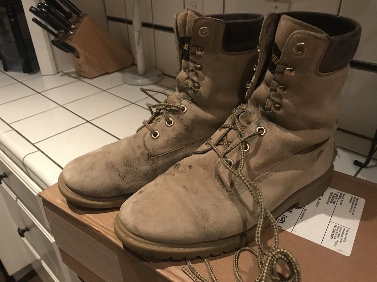 Colinlygren's tweet photo. For more than half my life these boots have served me well. Mom got ‘em for me in middle school. They’ve see pheasant hunts, wildfires, snow days, work days and office days. Heel came loose last week. Glued them up tonight and they’re good to go for another 16 years. @WolverineWW https://t.co/iC5yqFh6u1