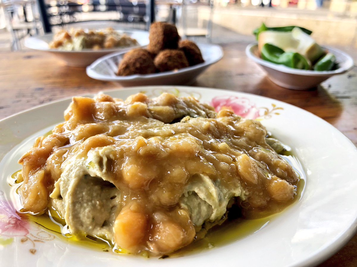 Hummusmovie's tweet photo. #OrenRosenfeld director of #Hummusthemovie with the #Documentary sound engineer #AmitEla Keith a classic #Jerusalem dish of golden dish. https://t.co/fhd1nntXH7