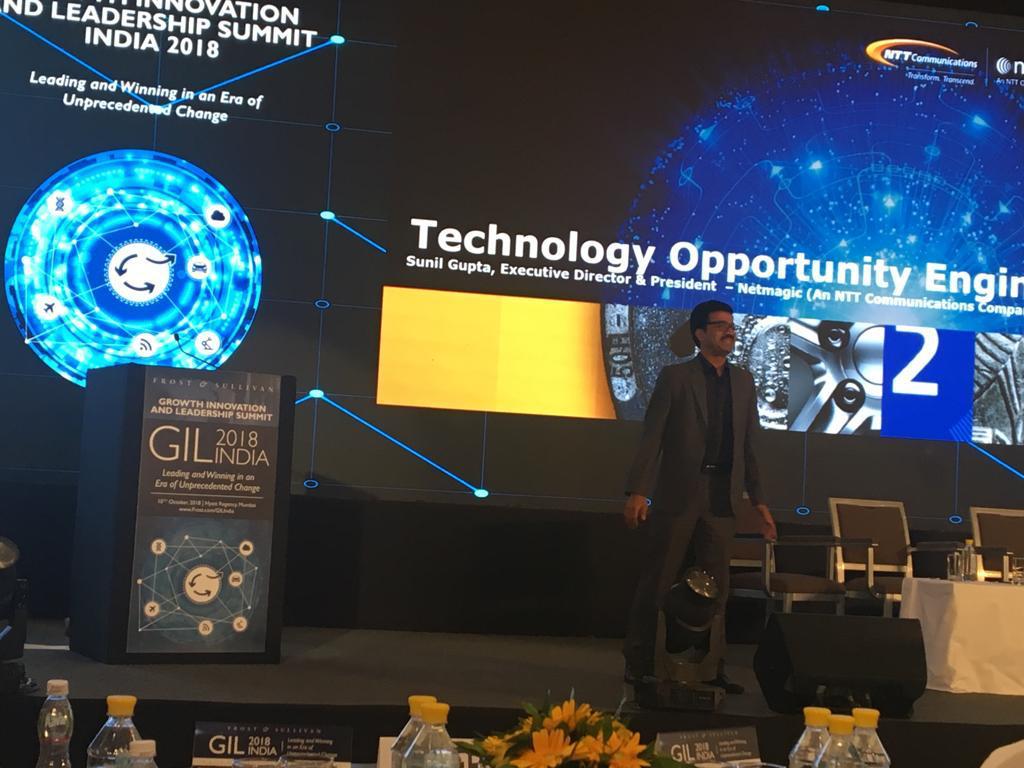 NTTDATA_APAC's tweet photo. NTT Com-Netmagic’s Sunil Gupta addresses the keynote today at @Frost_Sullivan GIL Summit 2018 - on how #digital initiatives are forcing #Infrastructure & #Cloud leaders in India to deliver reliable, innovative & cost-effective solutions to businesses #GIL2018 #AccelerateDigital https://t.co/3C6J9Jl1e4