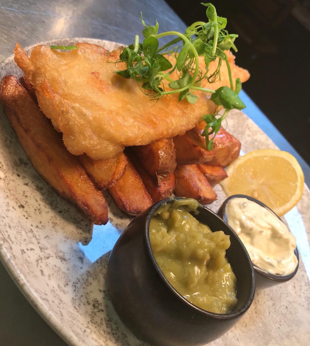 TheMarbleArch's tweet photo. Today we’ve woken up with a craving for the #MarbleArchKitchen’s proper fish and chips. Made with @marblebrewers Manchester Bitter and served with mushy peas, home made tartar sauce and the BEST thick cut chips around. We know what we’re having for lunch, what about you? https://t.co/zHSGHxwu5f