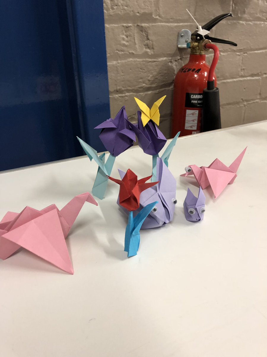 FltLt_Doherty's tweet photo. A bit of a different activity than usual last night, doing some origami as a way to relax the mind whilst making things. Not a bad effort overall considering few had done it before #origami #foldingthings #relax https://t.co/PzsRCq4rS7