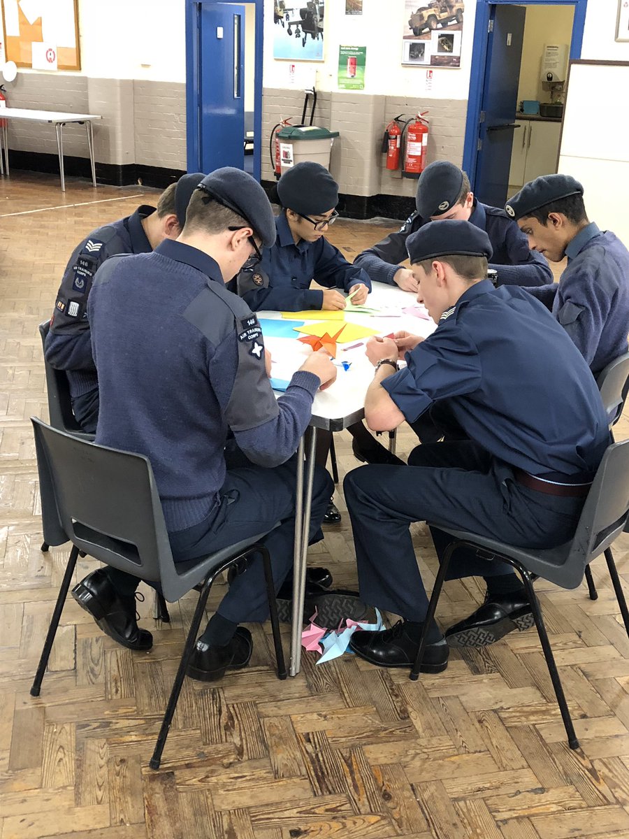 FltLt_Doherty's tweet photo. A bit of a different activity than usual last night, doing some origami as a way to relax the mind whilst making things. Not a bad effort overall considering few had done it before #origami #foldingthings #relax https://t.co/PzsRCq4rS7