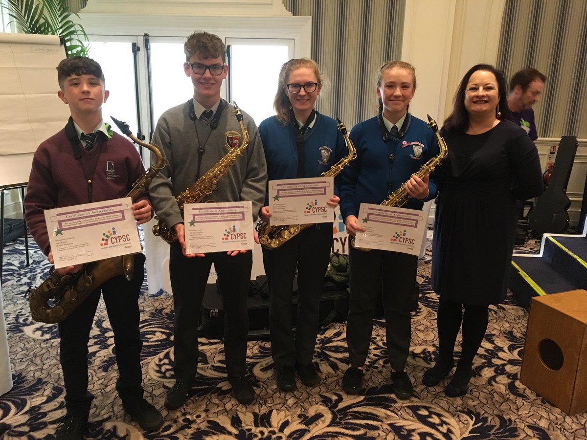CYPSCDL's tweet photo. @DonegalETB’s @DMEPmusic students Rory, Eoin, Caoimhe and Siobhan (Errigal Sextet) with our Coordinator Anne and certificates of participation for closing our launch event today. Thanks also to conductor Sean. #CYPSCDL https://t.co/yy0DRDm5gi