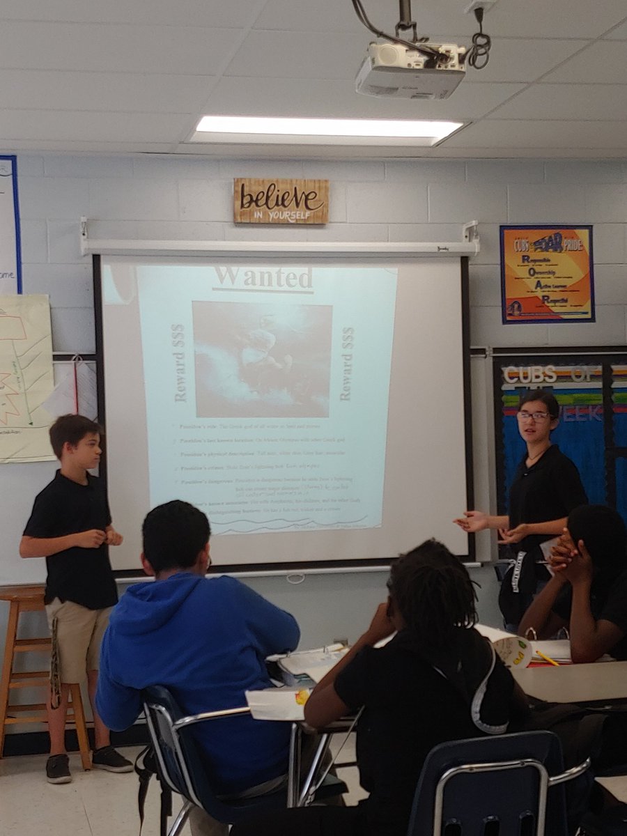 Some of our awesome 7th graders presenting their Wanted/Missing posters of Greek gods/goddesses during our unit dedicated to symbolism and mythology.  #ProjectBasedLearning #GrecoMS #AchievementSchool #RoaringTogetherWithExcellence