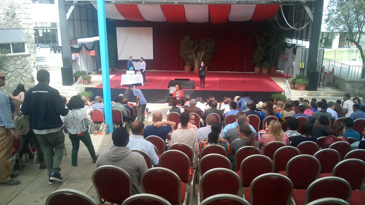 ICSAddis's tweet photo. Teachers and staff filling in the @ICSAddis amphitheatre for the assembly with @TomSchimmer. #essentialassessment #icsPLC https://t.co/Z9leR8mM1X