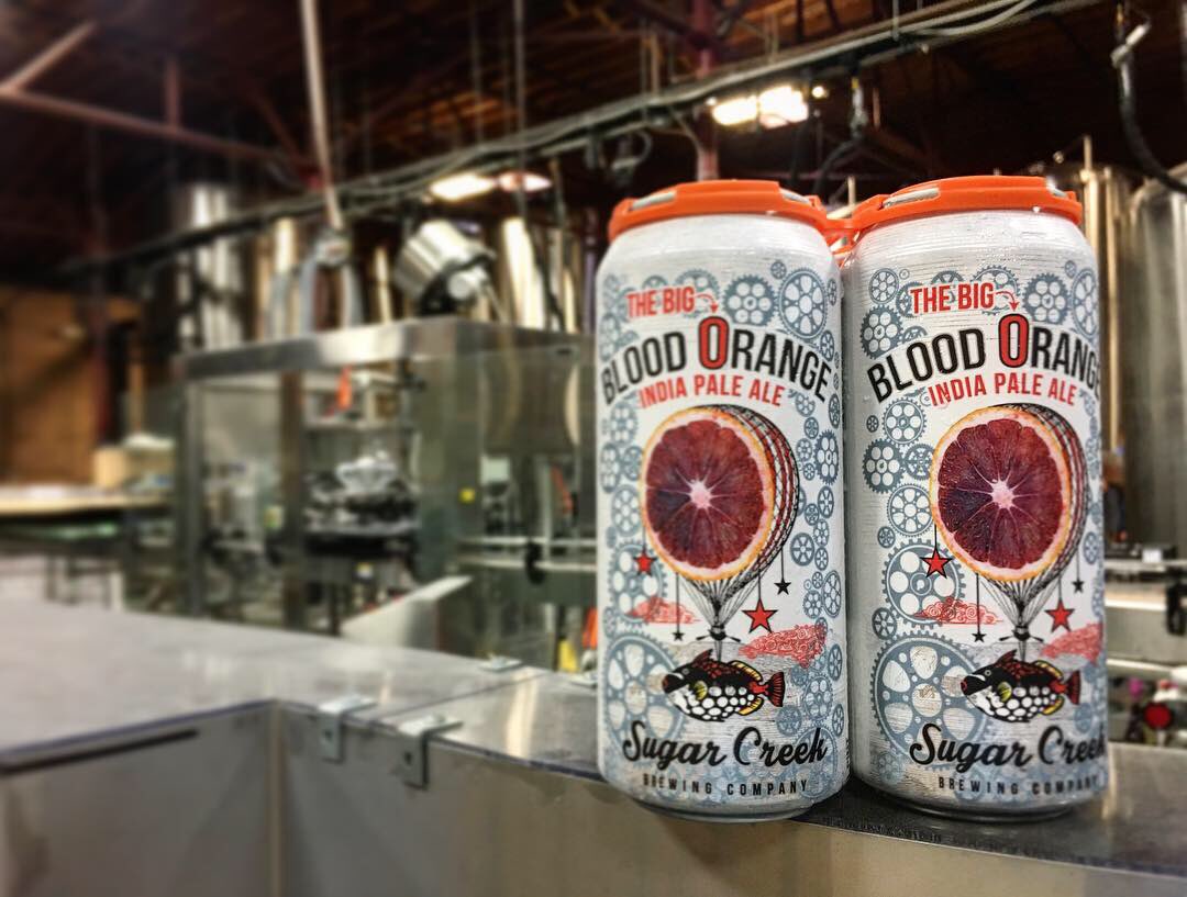 It’s OFFICIAL: You spoke and we listened. Sugar Creek is officially in cans as well as your favorite bottles. Look for the BIG OH Blood Orange IPA in 16oz 4 packs at grocery stores and bottle shops near you!