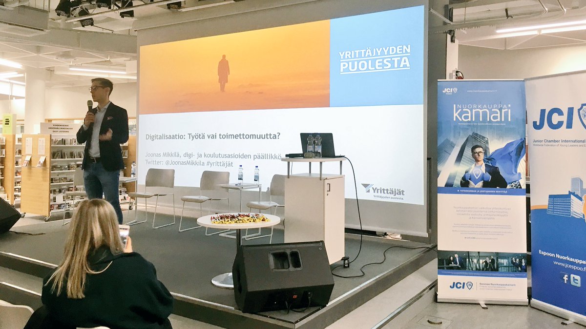 JaniMantysaari's tweet photo. Kolmas keynote-puheenvuoro alkaa Voltairen sitaatilla #työ:n olemuksesta. Puhujana @JoonasMikkila (@suomenyrittajat). #digitalisaatio #ENKK50 #enkk50vuotta #jciespoo #orangeactions https://t.co/X0k6FAK8PG