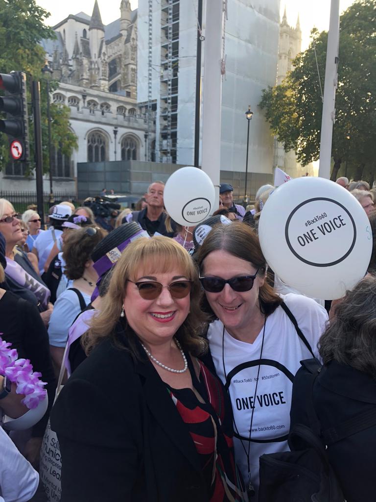 SharonHodgsonMP's tweet photo. Great to see my constituent @dingabelle at the WASPI rally in parliament square. So many people here standing #shouldertoshoulder and demanding #backto60 for #50swomen. https://t.co/43PaB3ZvUT