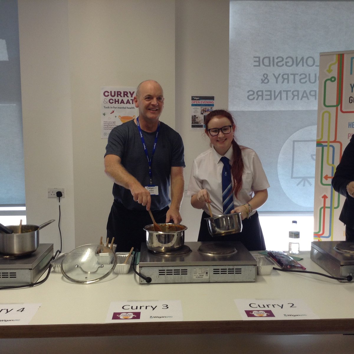 UTCWigan's tweet photo. We welcomed a guest speaker who shared his experiences of working in the Mental Health system for #WorldMentalHealthDay

Staff and students took the time to talk during our Curry and Chaat event, involving a tasting competition to raise funds for the Mental Health Foundation https://t.co/2bv1dUD8Ri