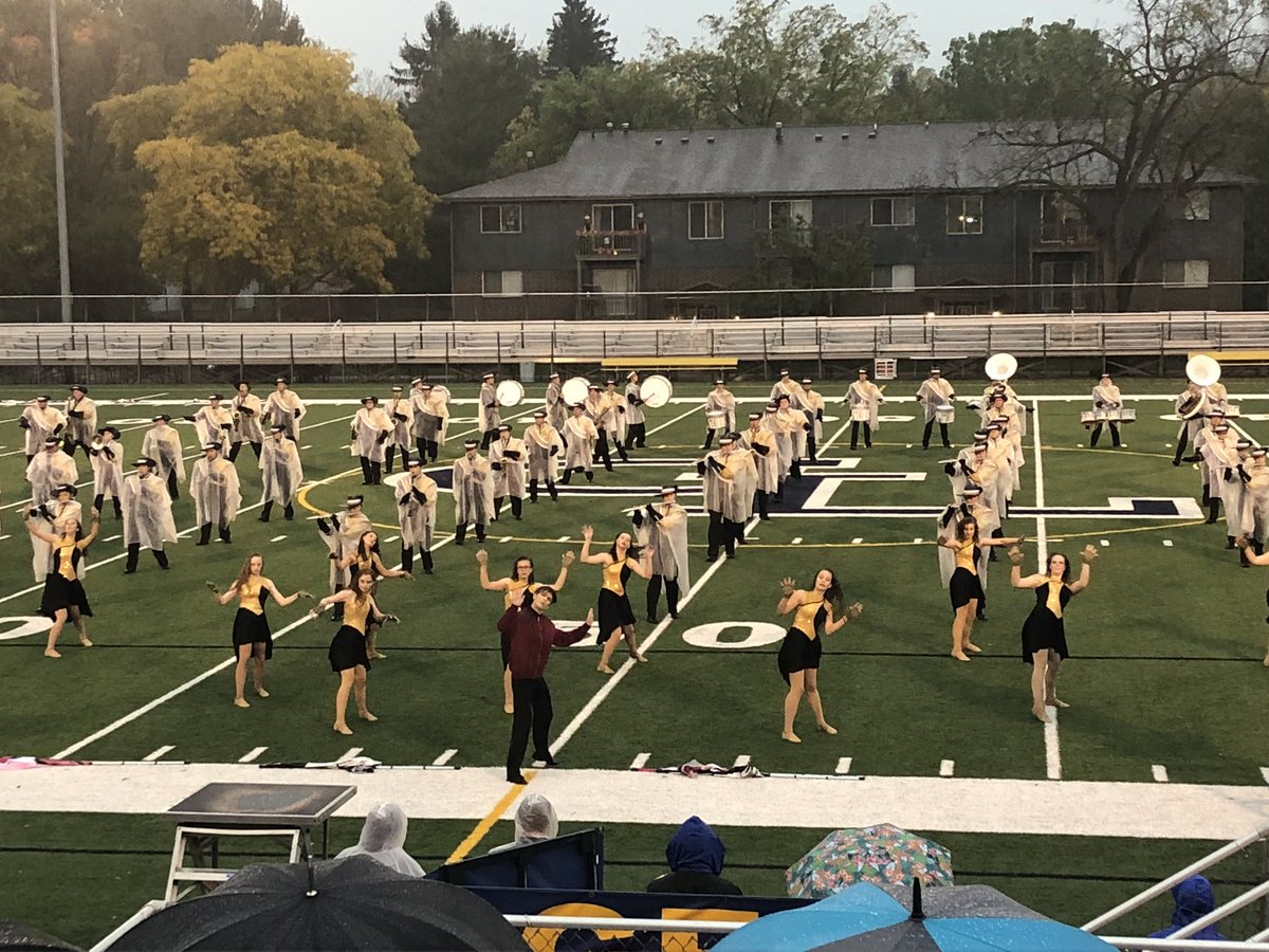 mrs_luft's tweet photo. Even in the pouring rain the Marching Cavs rocked the Grand Ledge Marching Exhibition! @Corunna_Bands  #Gr82bGOLD https://t.co/e5Soam3dYE