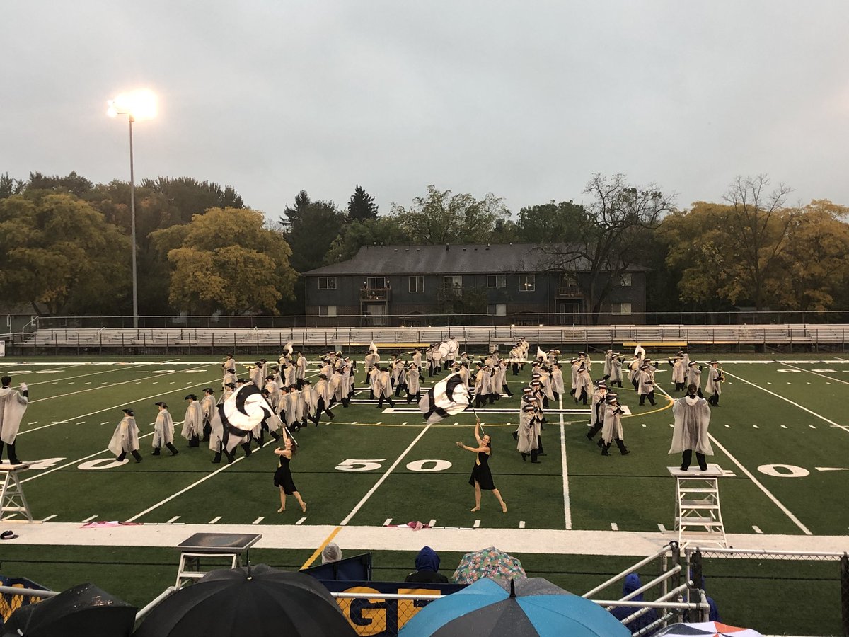 mrs_luft's tweet photo. Even in the pouring rain the Marching Cavs rocked the Grand Ledge Marching Exhibition! @Corunna_Bands  #Gr82bGOLD https://t.co/e5Soam3dYE