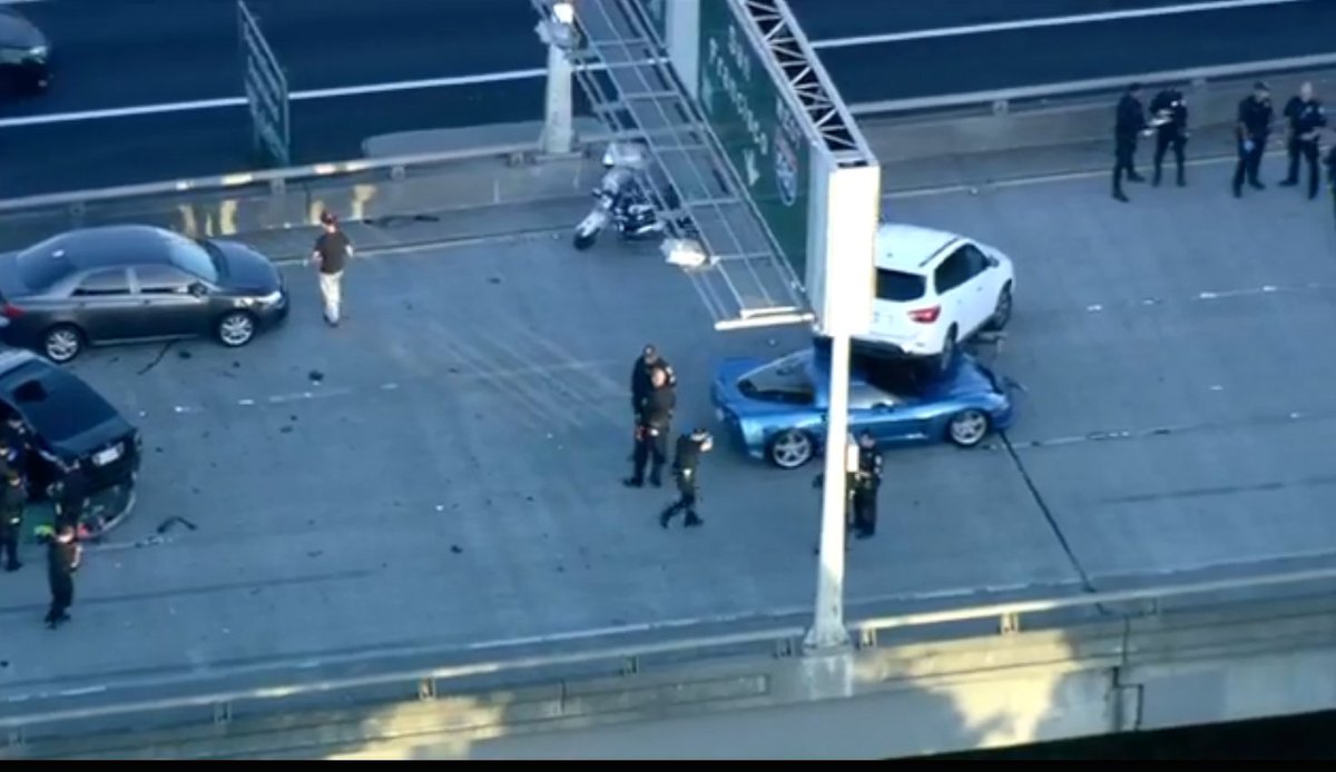 KTVU's tweet photo. #BREAKING: @TomVacarKTVU reports at least 2 cars stacked on top of each on the freeway 580 on-ramp off of 24 WB #Oakland https://t.co/nYhRDRYBn7