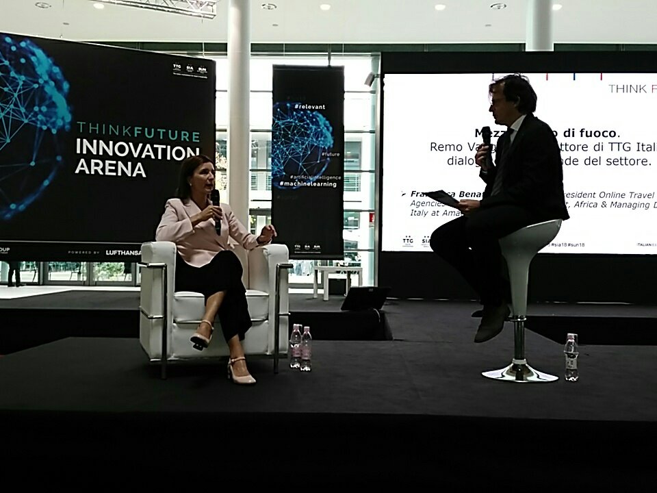 rita_pucci's tweet photo. A Mezzogiorno di fuoco #TTG2018 sul palco @francescabenati di @AmadeusItalia intervistata dal direttore di @ttgitalia @removangelista #thinkfuture @IEGexpo https://t.co/dczmQSPMQy