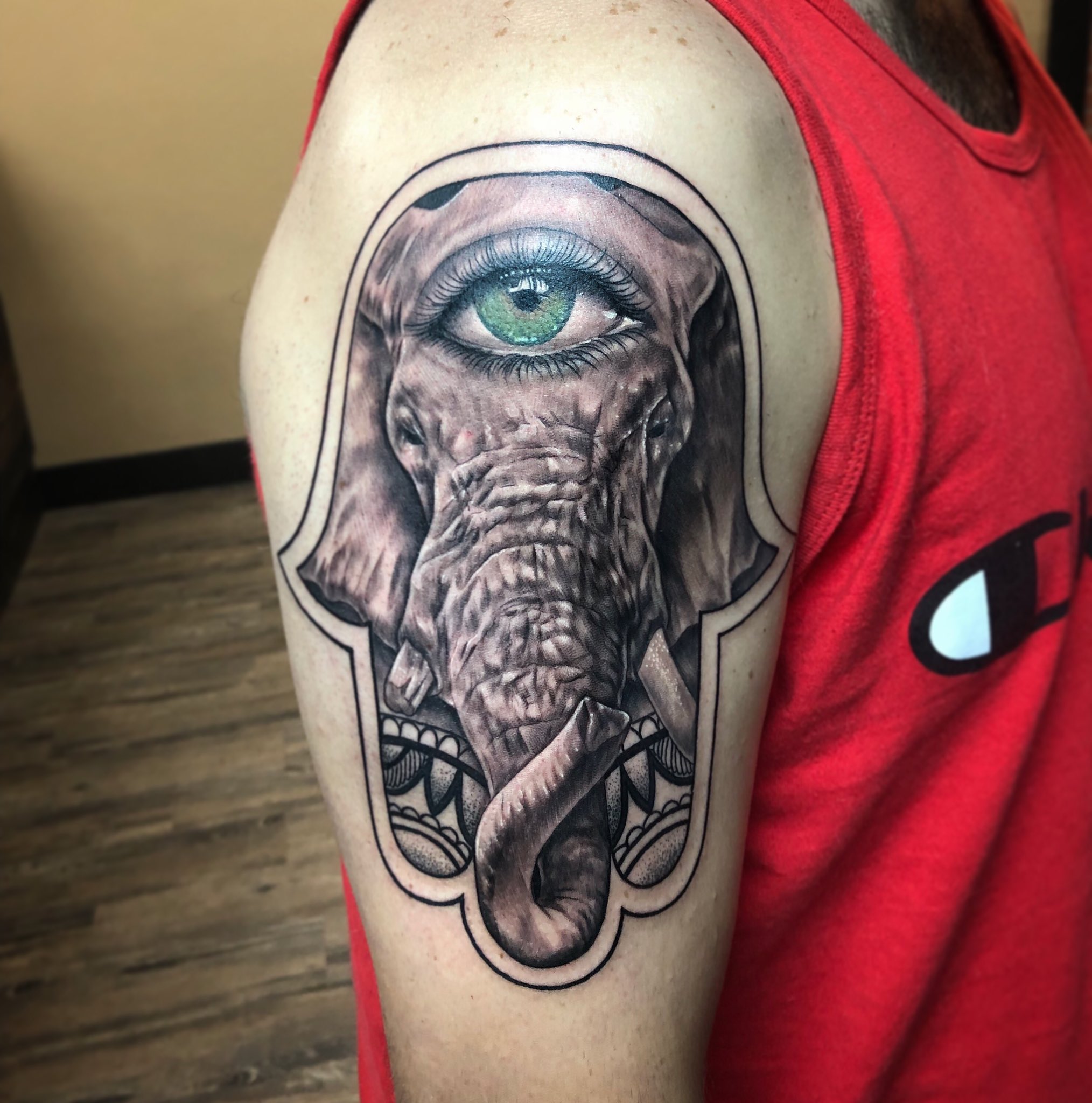 Top 125 + Hamsa elephant tattoo